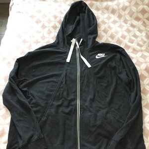Nike dark grey zip up jacket.